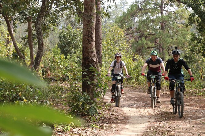 Stairway to Heaven Trail Mountain Biking Tour Chiang Mai - Getting coached uphill: pacing on steep off-road grades