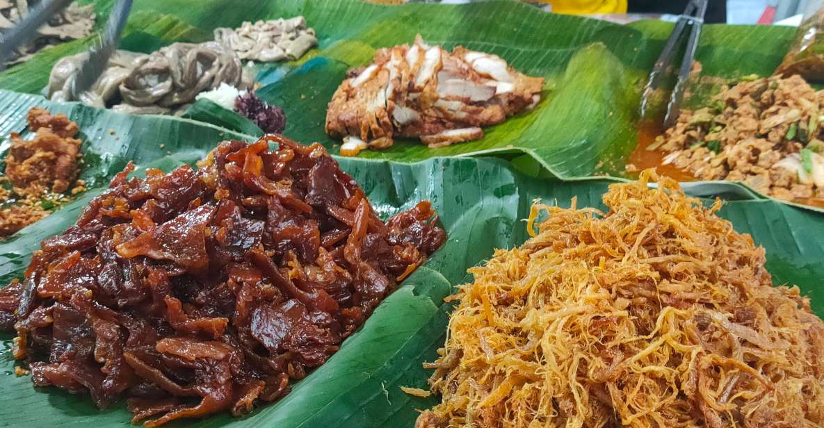 Takua Pa: Food Market, Tsunami Museum, Temple, & Old Town - Kong Ka Temple and its Rama IX pagoda: striking design plus real temple etiquette