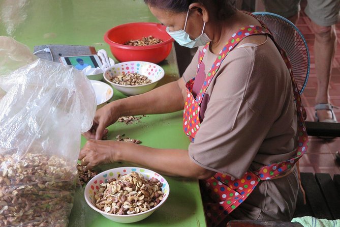 The Lost Zone & Takuapa Old Town – Private Guided Tour - Sliding into Takua Pa Old Town: temples, a market vibe, and truck-taxi travel