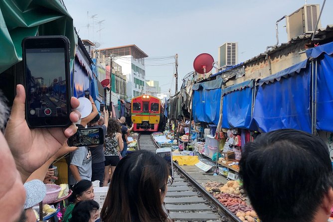 Train & Floating Market Food Adventure + Scenic train ride - How bartering and tasting work in real life