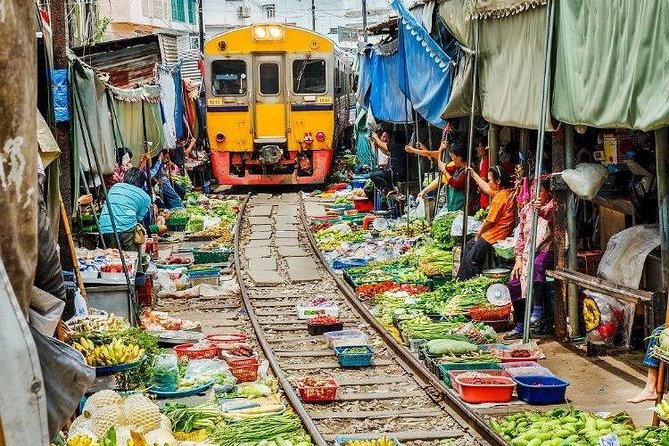 Train Market and Floating Market half day tour - The guide experience: English, explanations, and one caution