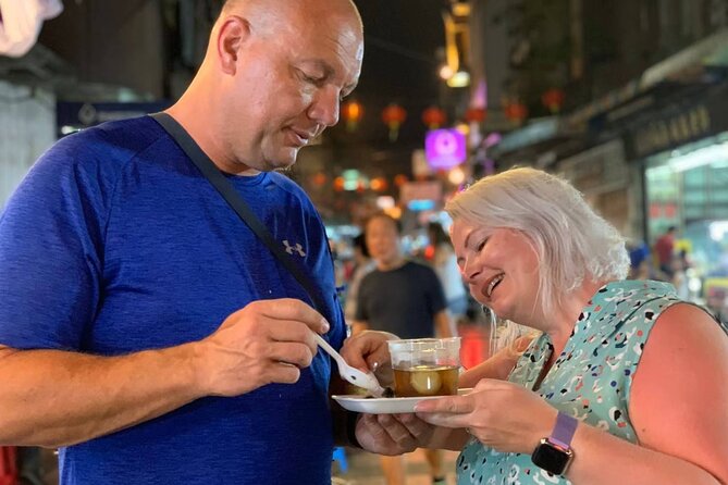 Tuk-tuk tour Bangkok by Night with Chinatown meal and hotel transfers - Grand Palace and Wat Pho: Short Stops, Big Landmarks